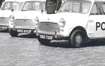 Front view of several Liverpool police Minis in line-up